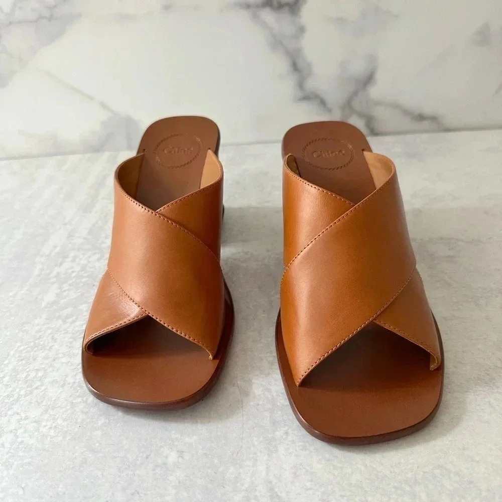 Chloe Laia Raffia-trimmed Mules
